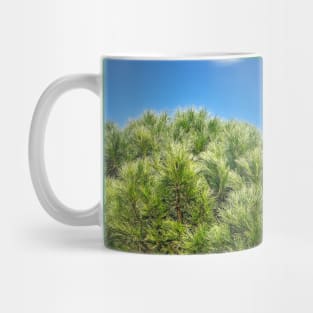 green pine and blue sky Mug